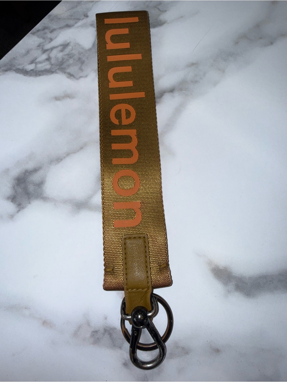 Lululemon Mustard Yellow Key Holder with Orange Logo Font